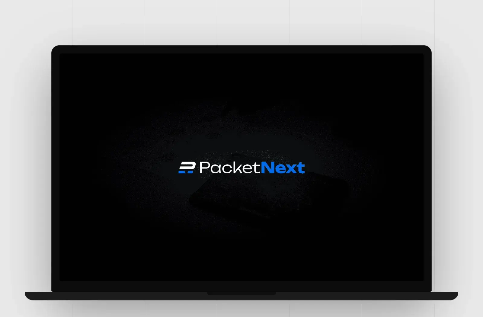 PacketNext website on a laptop, designed by SaintsHood